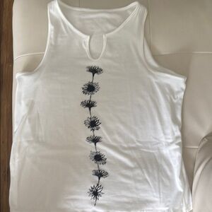 White Sleeveless Top with Black Floral Design